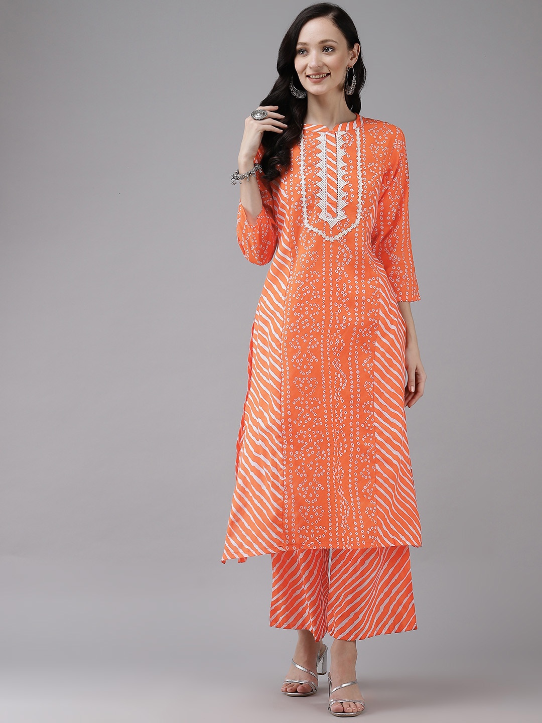 

Bhama Couture Women Orange Bandhani Printed Kurta with Palazzos