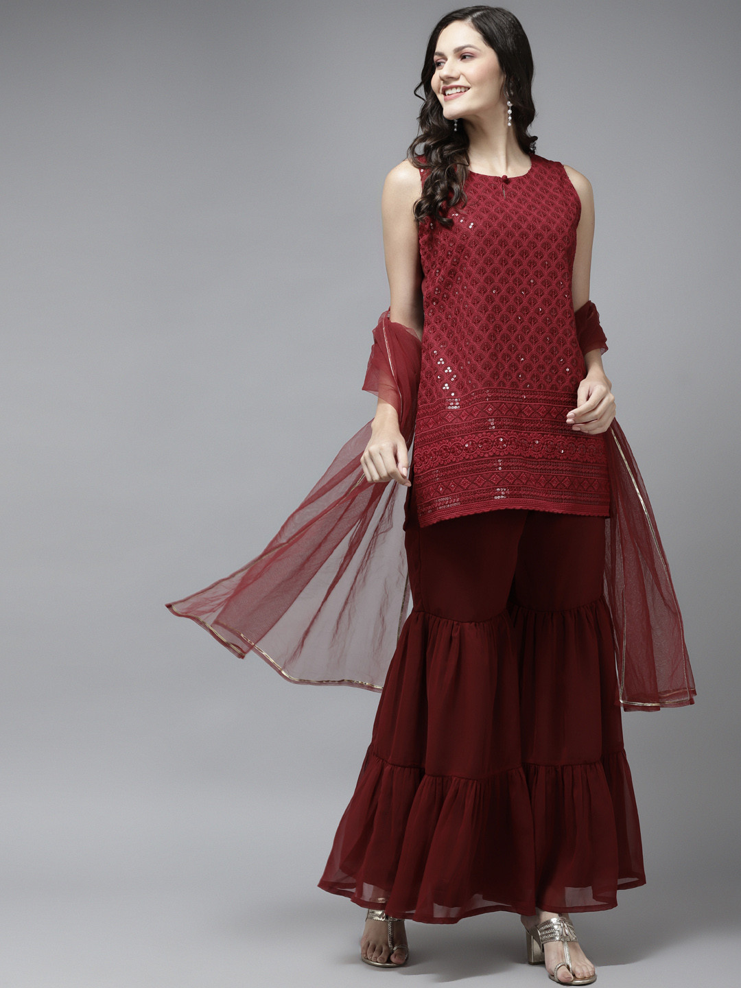 

Bhama Couture Women Maroon Ethnic Motifs Embroidered Sequinned Kurta with Sharara & With Dupatta