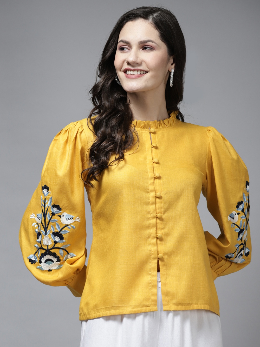 

Bhama Couture Mustard Yellow Floral Print Ruffles Shirt Style Top