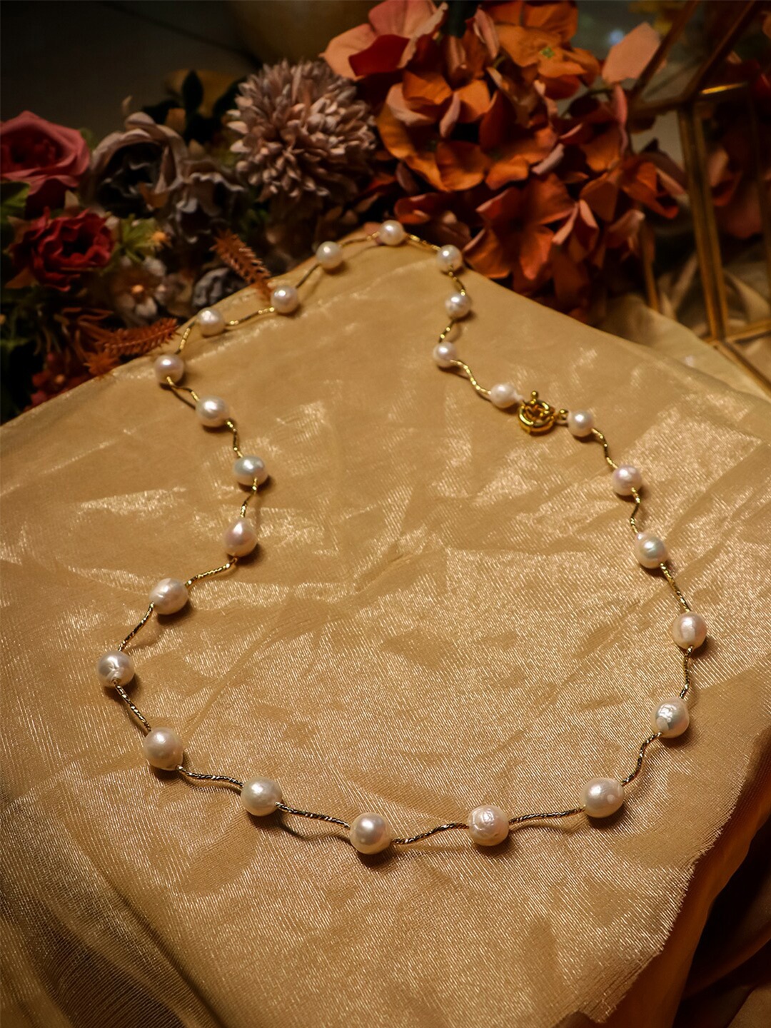 

Ishhaara Gold-Toned & Cream-Coloured Brass-Plated Pearl Necklace