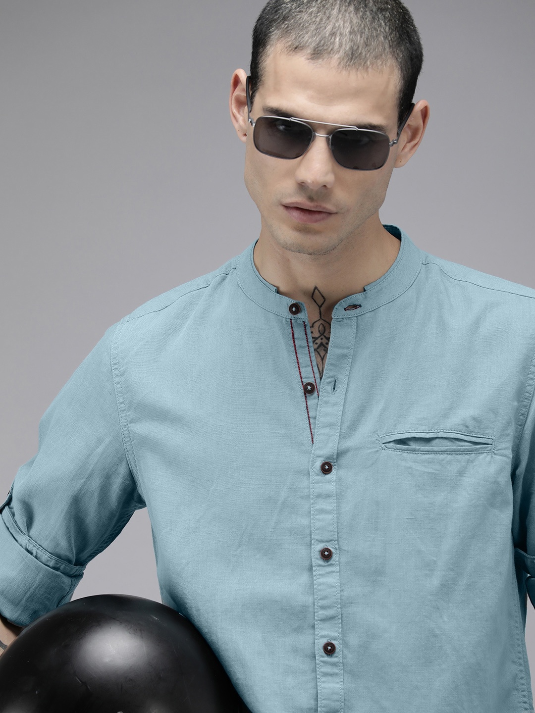 

The Roadster Lifestyle Co. Men Blue Solid Mandarian Collar Roll-Up Sleeves Casual Shirt