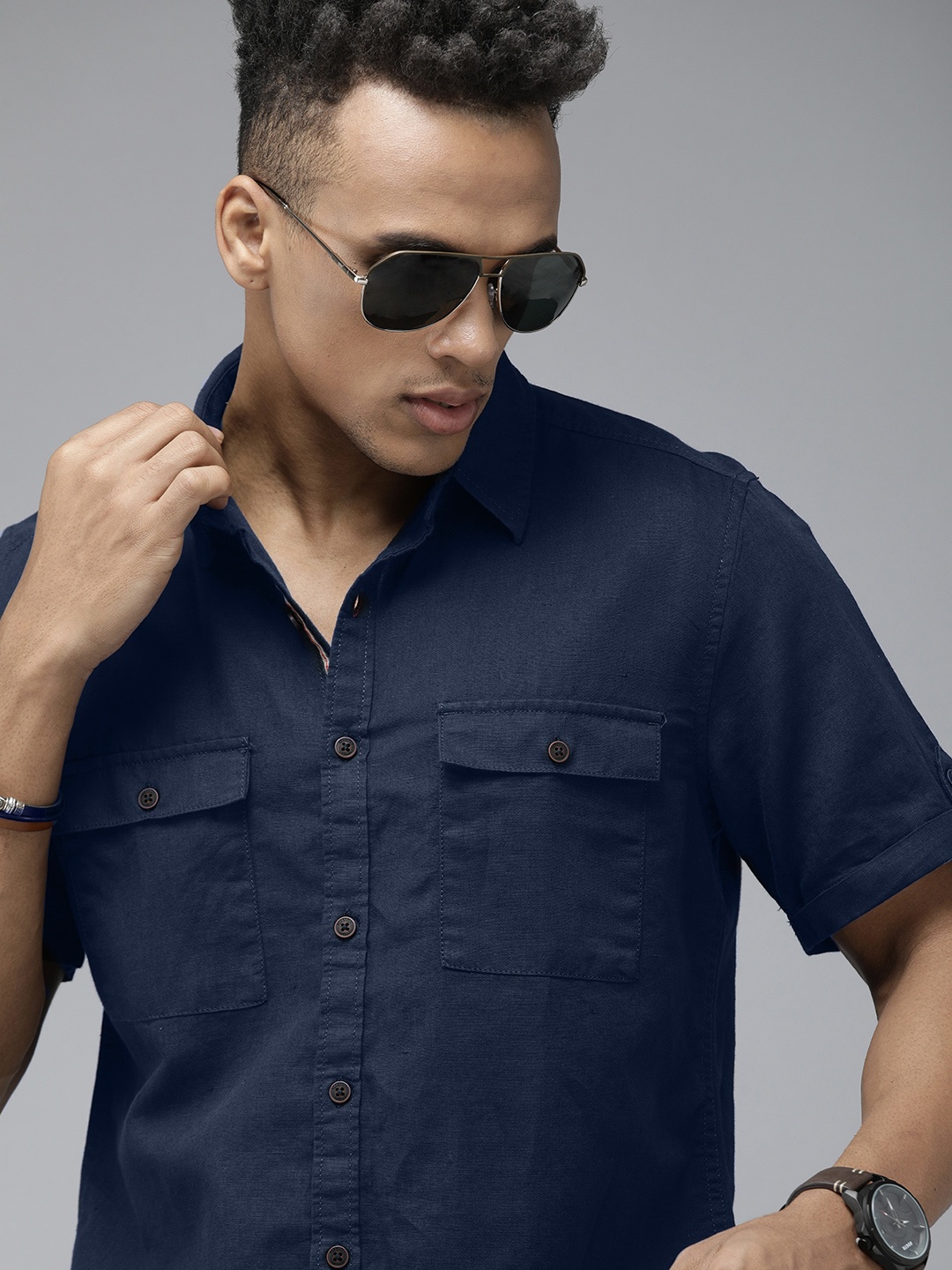 

The Roadster Lifestyle Co. Men Blue Solid Slim Fit Pure Cotton Casual Shirt