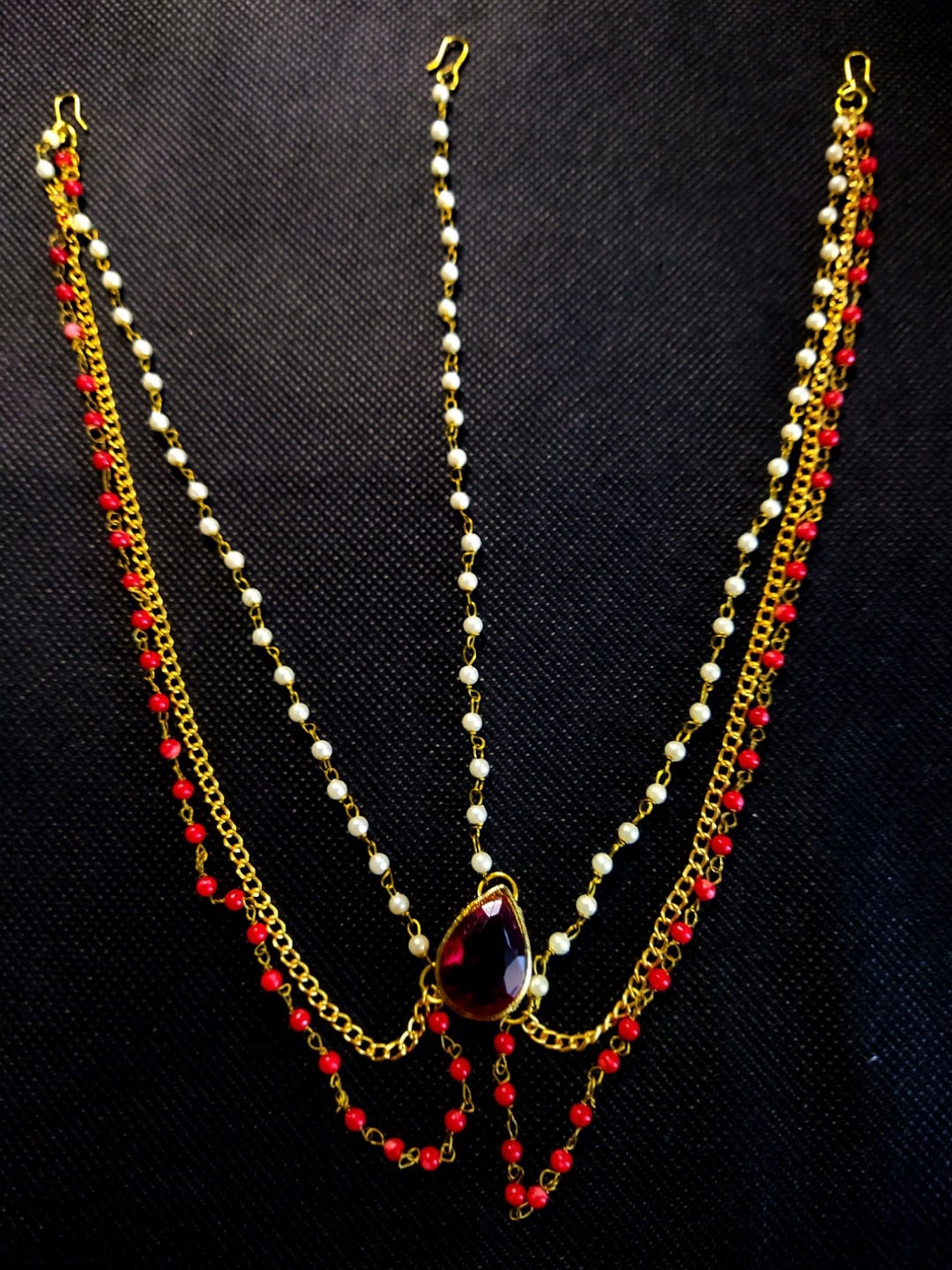

Kshitij Jewels Gold-Plated Maroon Stone-Studded Matha Patti