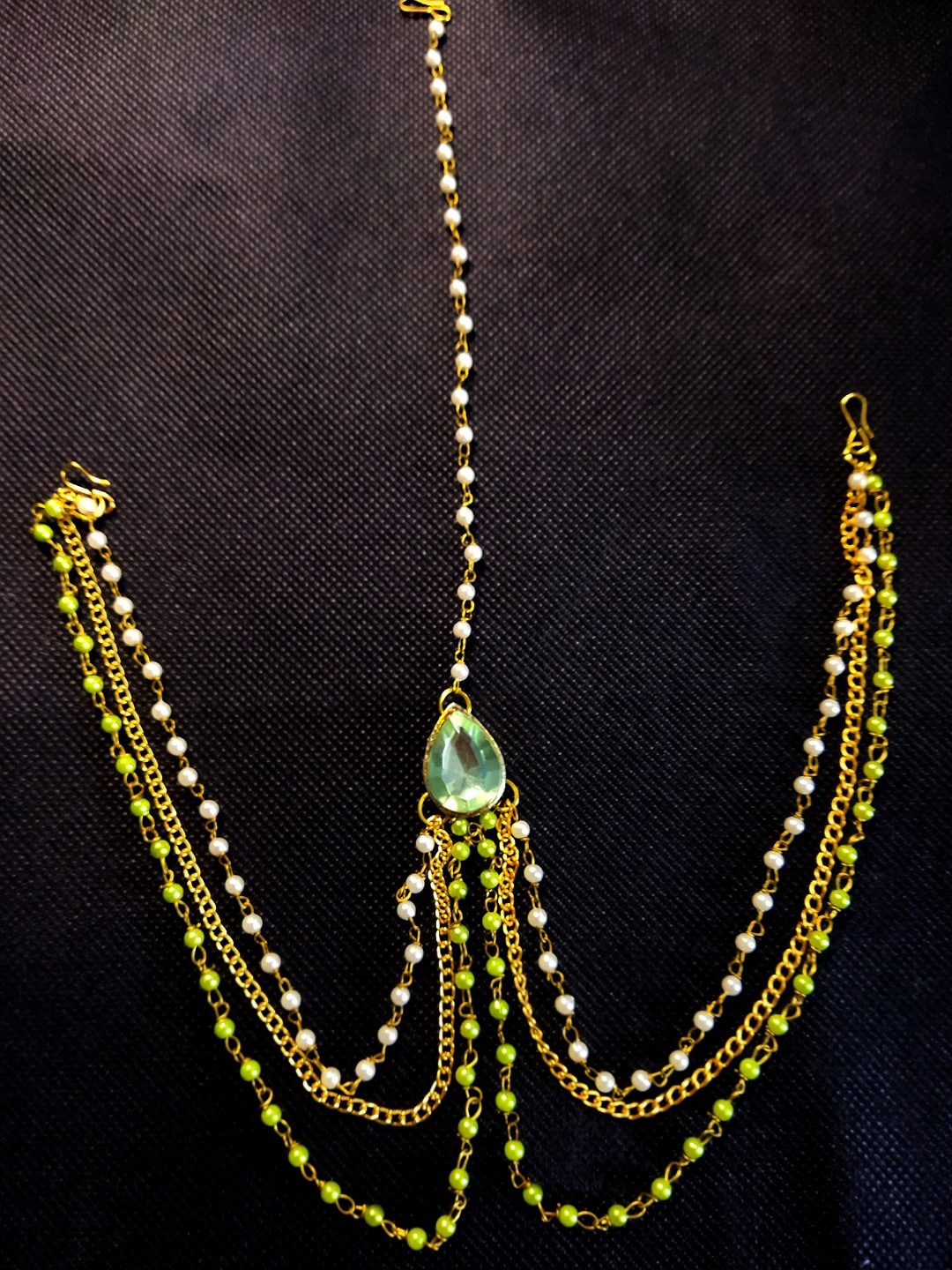 

Kshitij Jewels Gold-Plated Green Stone-Studded Hair Jewellery