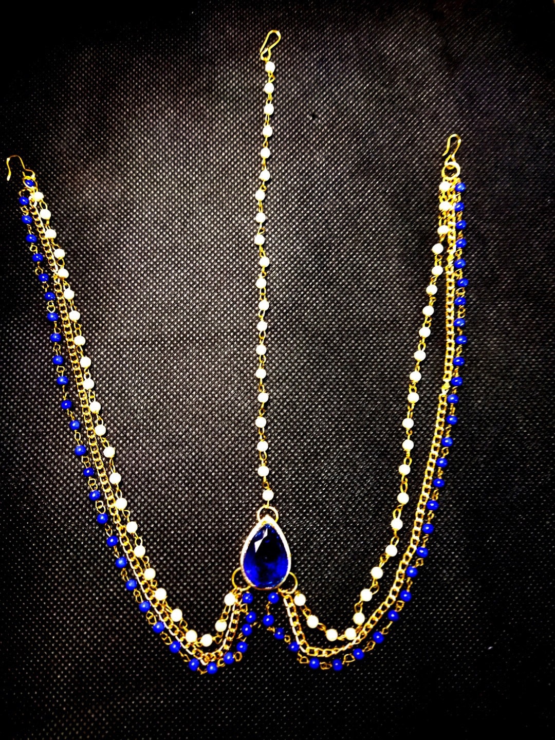 

Kshitij Jewels Gold-Plated Blue Stone-Studded Matha Patti