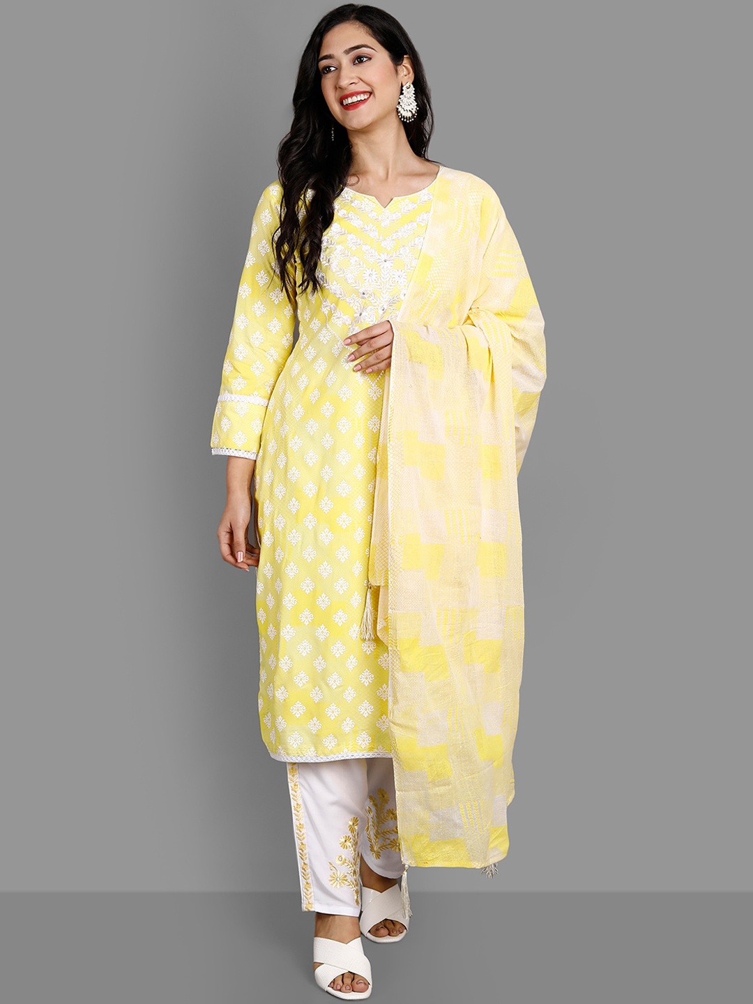 

Ziva Fashion Women Yellow Ethnic Motifs Yoke Design Panelled Kurti with Trousers & With Dupatta