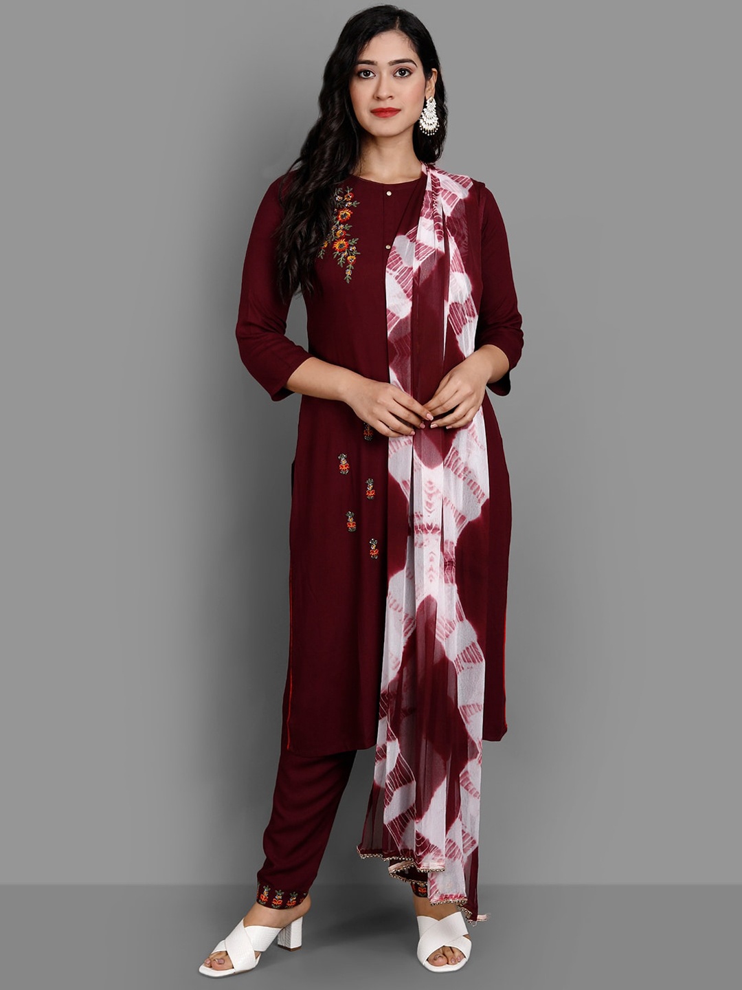 

Ziva Fashion Women Brown Floral Embroidered Panelled Kurti with Trousers & With Dupatta