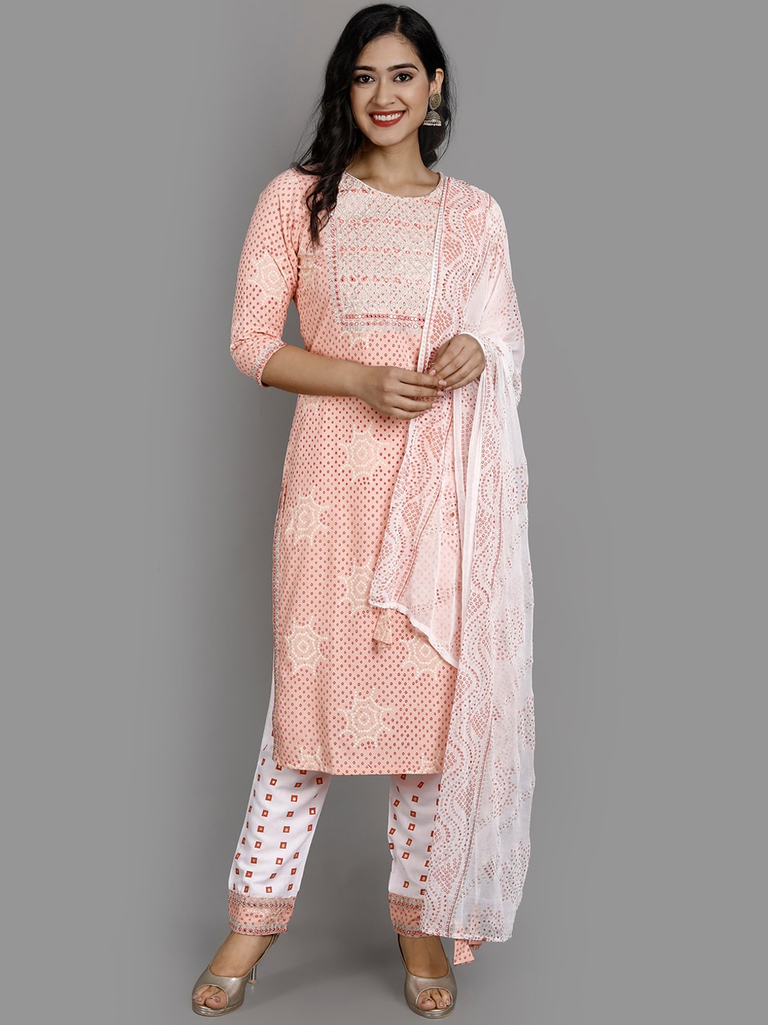 

Ziva Fashion Women Peach-Coloured Paisley Embroidered Panelled Kurti with Trousers & With Dupatta