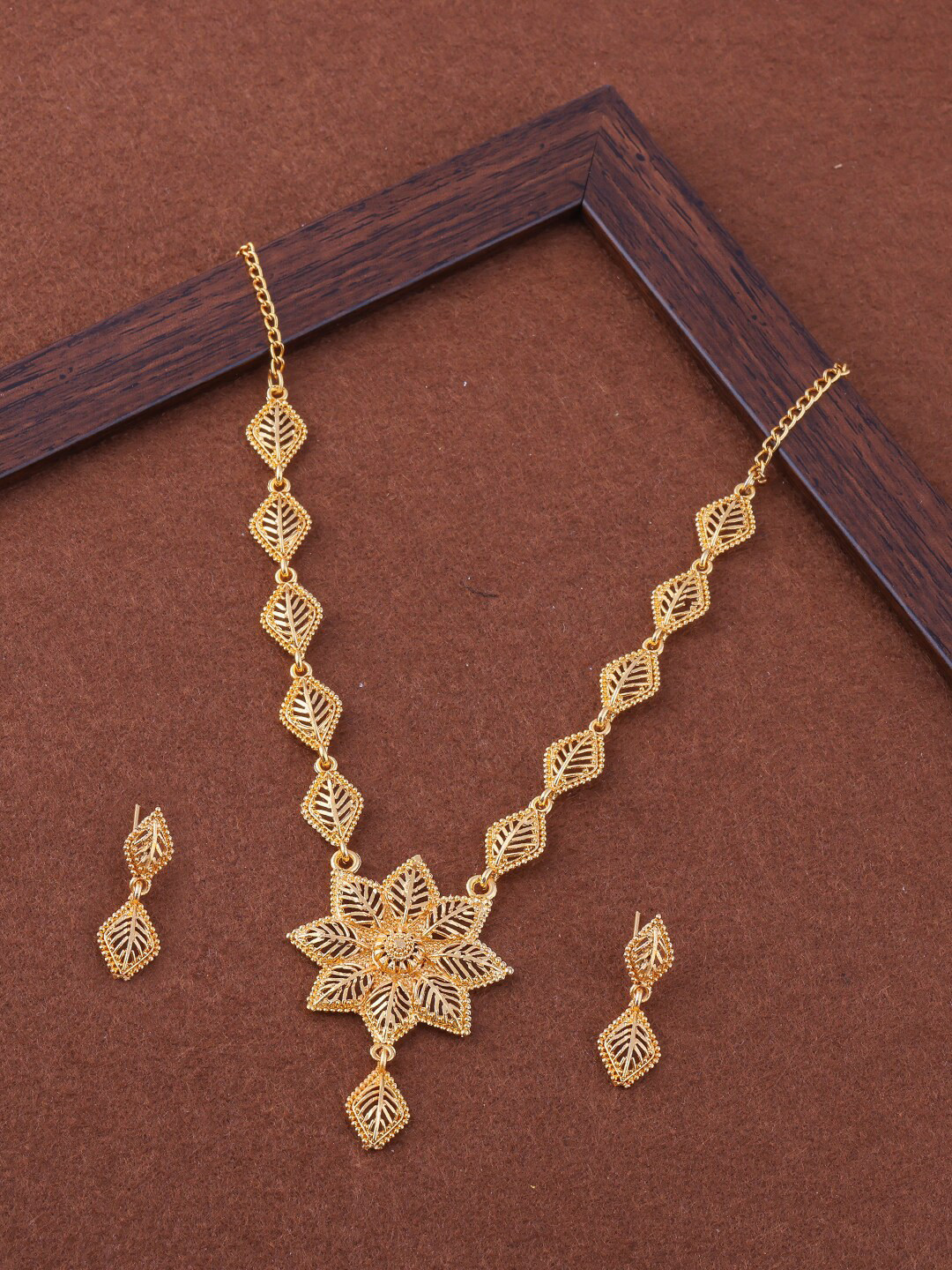 

Brandsoon Women Gold Plated Stone studded & Beaded Floral Shaped Jewellery Set