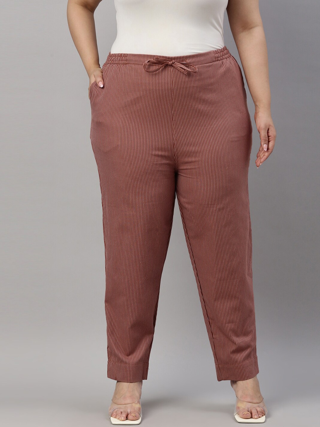 

Go Colors Women Rust Tapered Fit Trousers