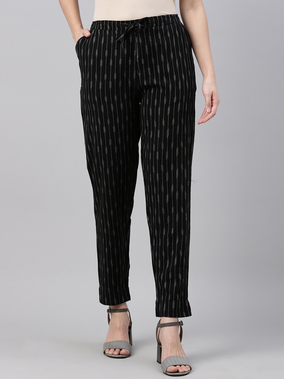 

Go Colors Women Black Striped Tapered Fit Trousers