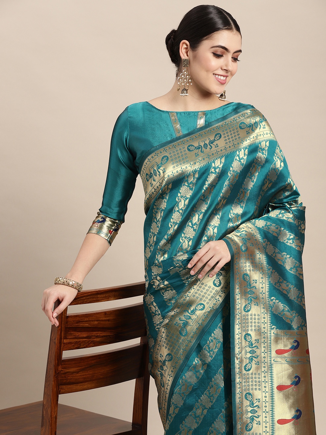 

VAIRAGEE Teal Green & Golden Ethnic Motifs Pure Silk Saree