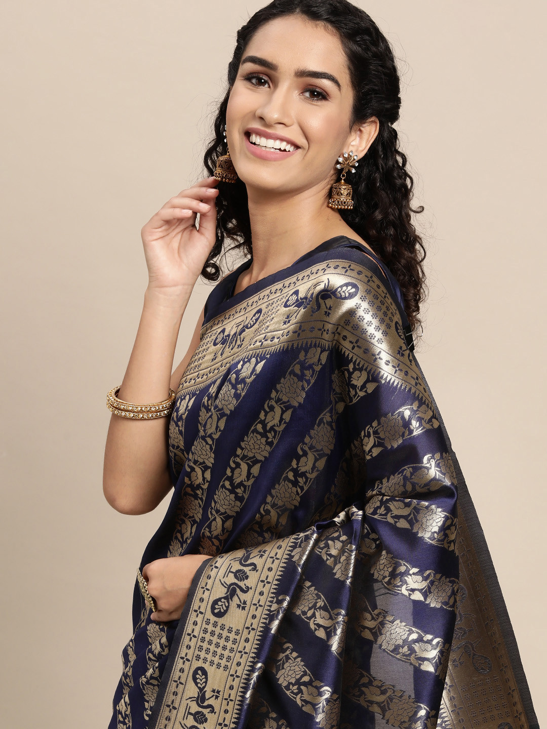 

VAIRAGEE Navy Blue & Golden Ethnic Motifs Pure Silk Saree