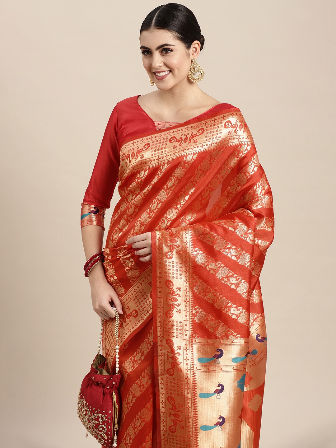 

VAIRAGEE Red & Golden Ethnic Motifs Pure Silk Saree