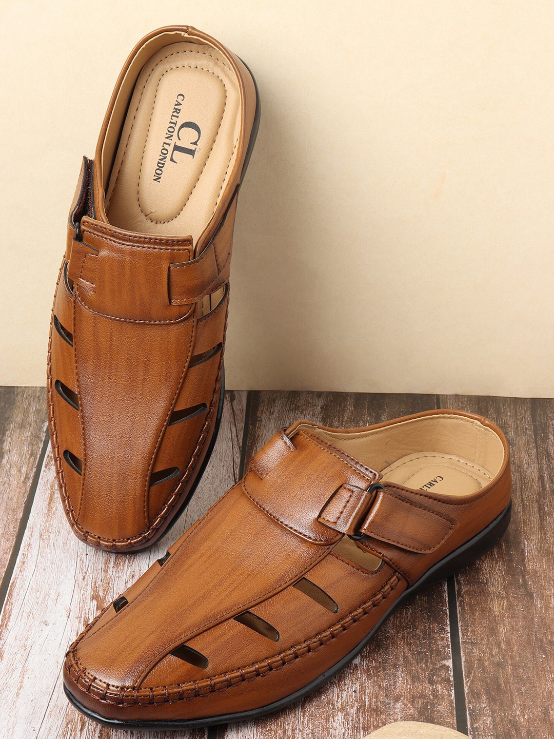 

Carlton London Men Brown & Tan Fisherman Sandals