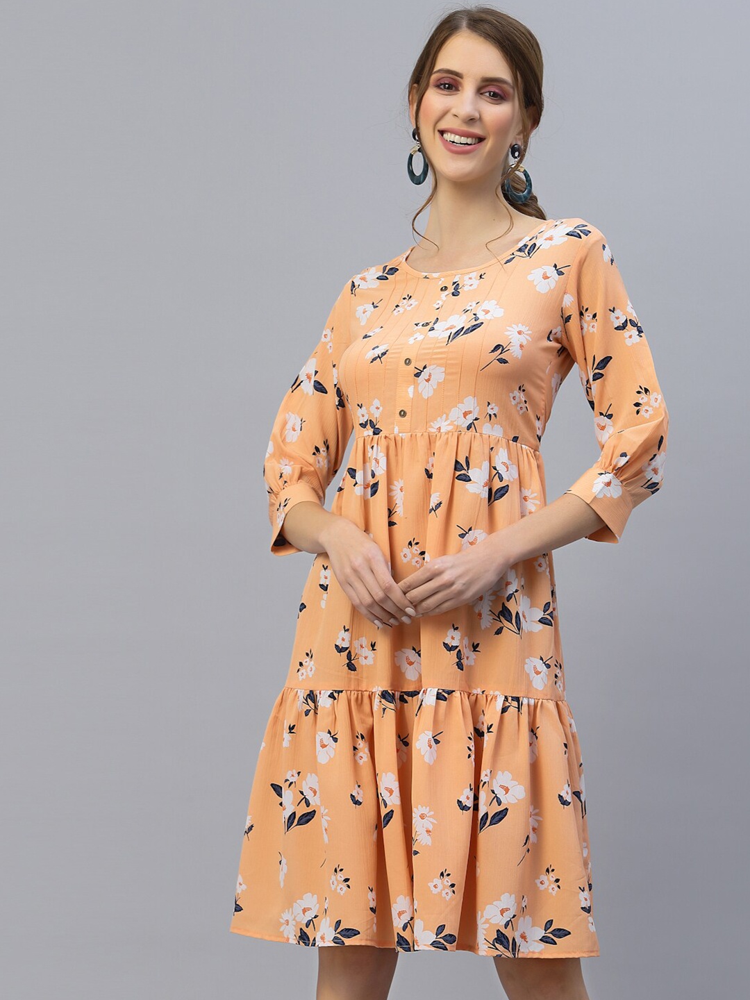 

Selvia Peach-Coloured Floral Crepe Empire Dress