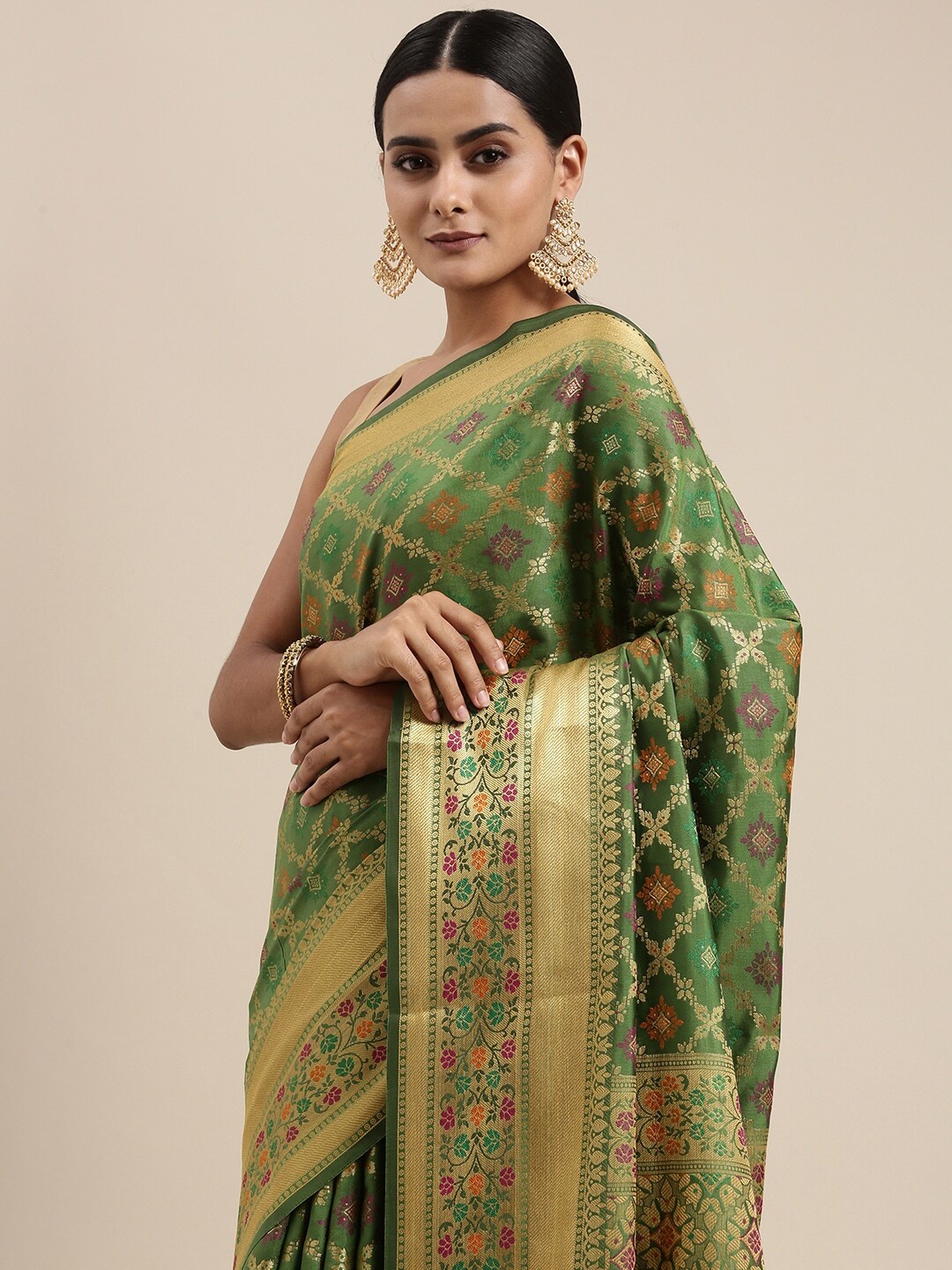 

Mitera Green Ethnic Motifs Woven Design Silk Cotton Chanderi Saree