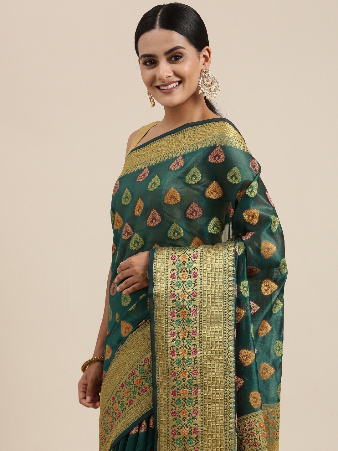 

Mitera Teal Green Ethnic Motifs Zari Organza Silk Banarasi Saree