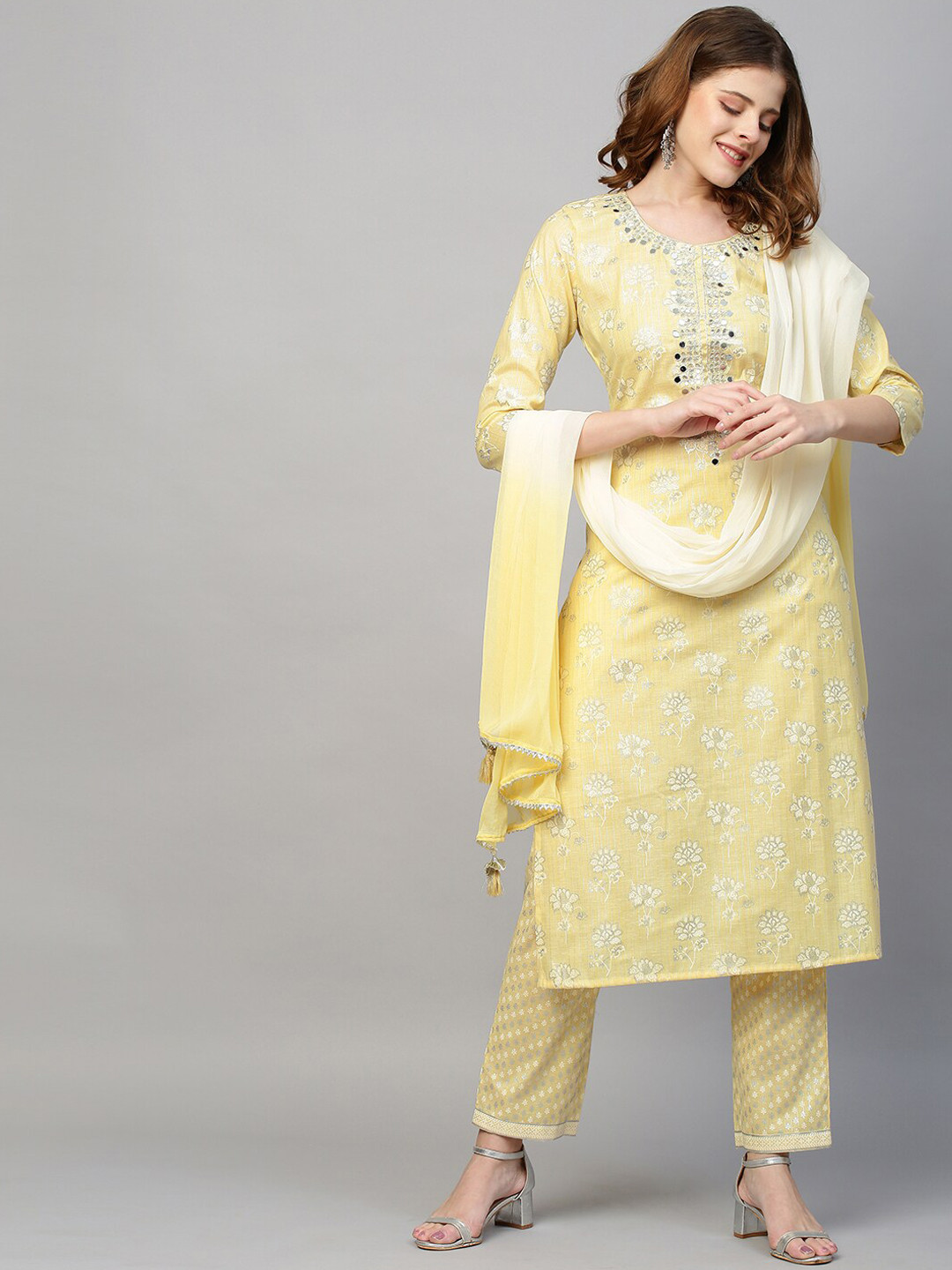 

FASHOR Women Yellow Floral Embroidered Pleated Gotta Patti Pure Cotton Kurti with Trousers & With Dupatta