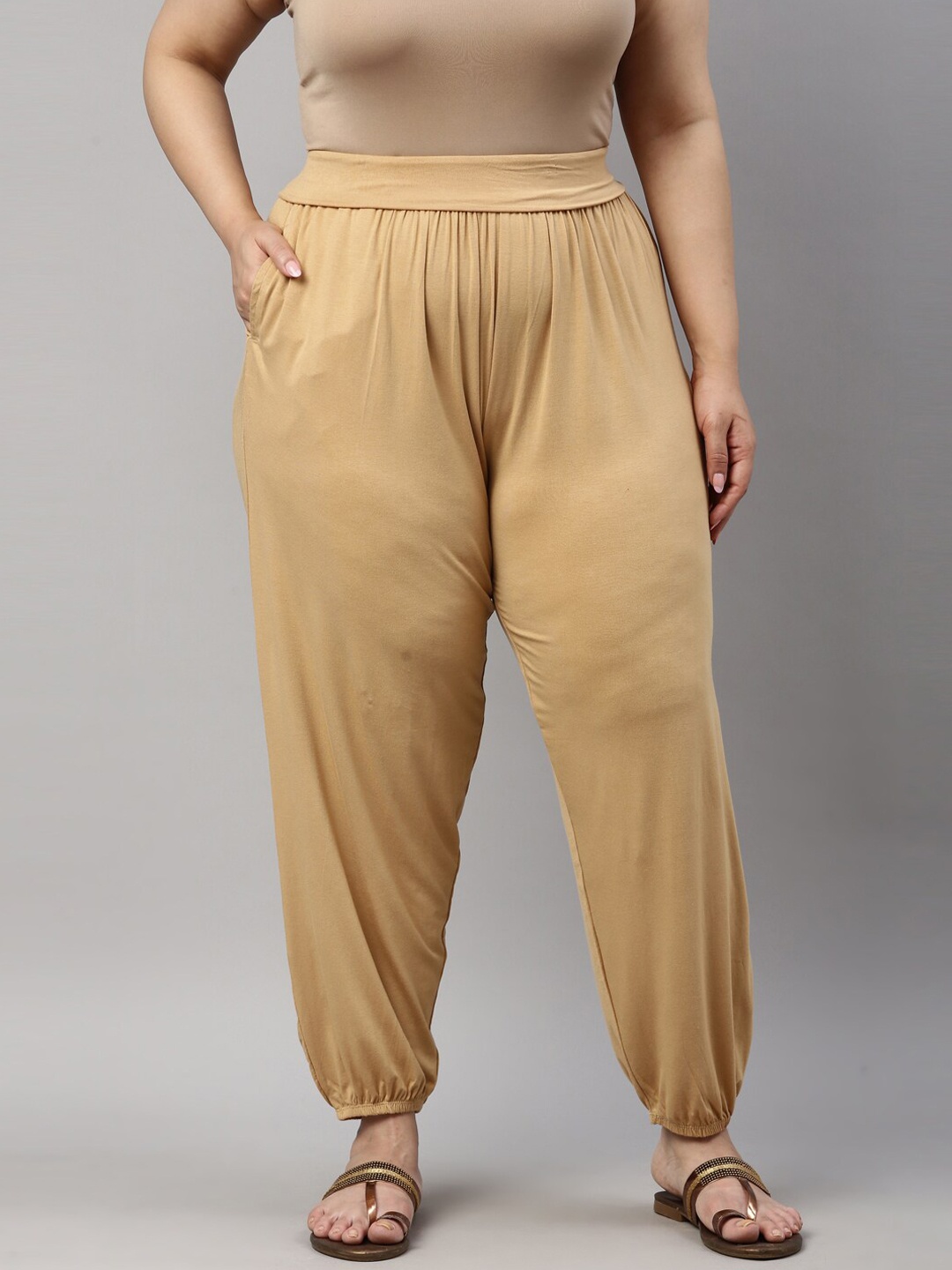 

Go Colors Women Beige Solid Loose-Fit Harem Pants