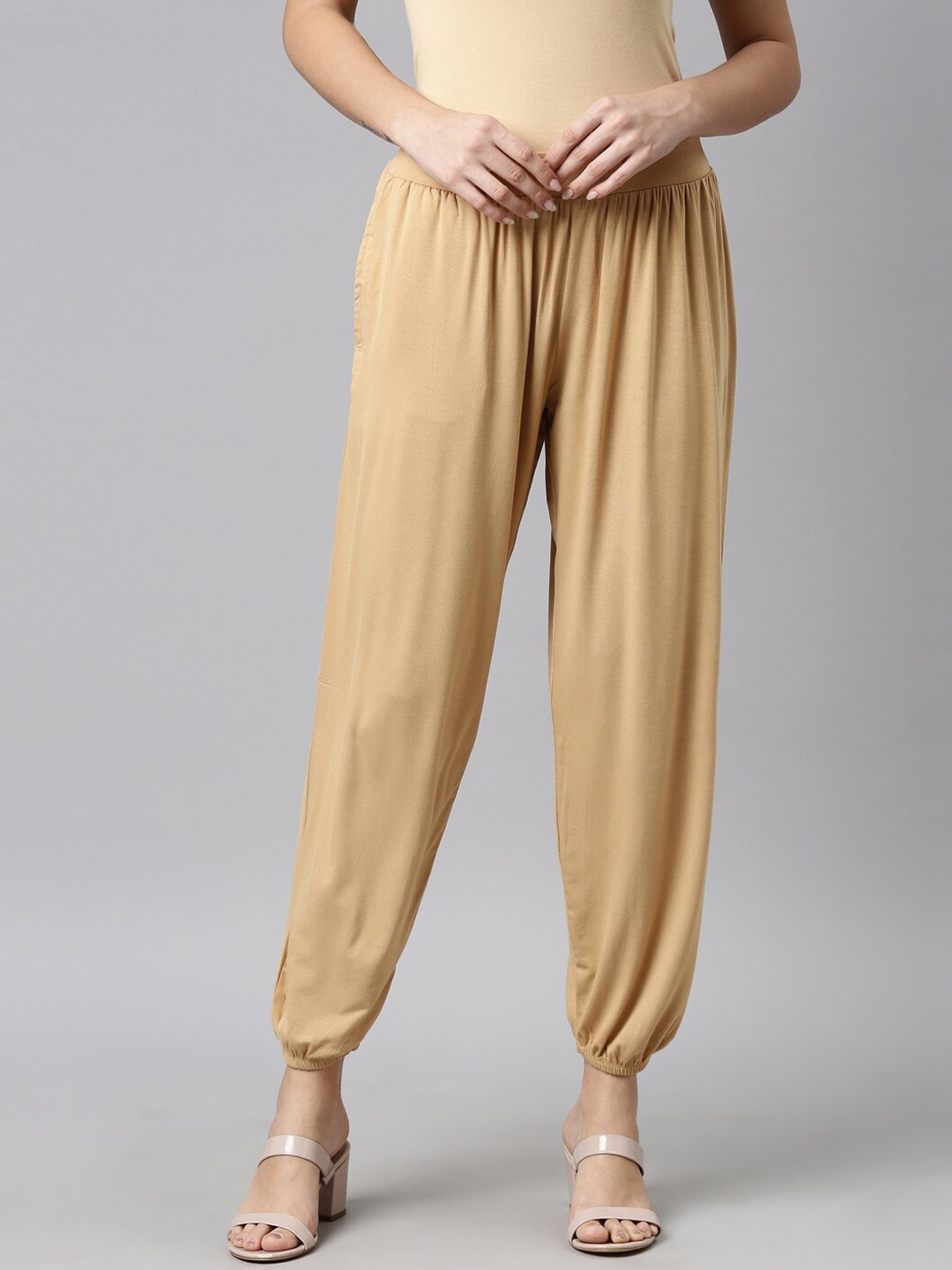 

Go Colors Women Beige Solid Loose Fit Harem Pants