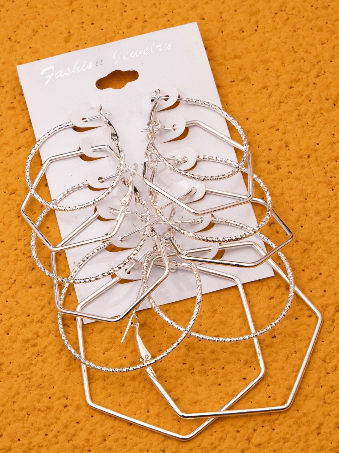 

anore Silver-Toned Circular Ear Cuff Earrings