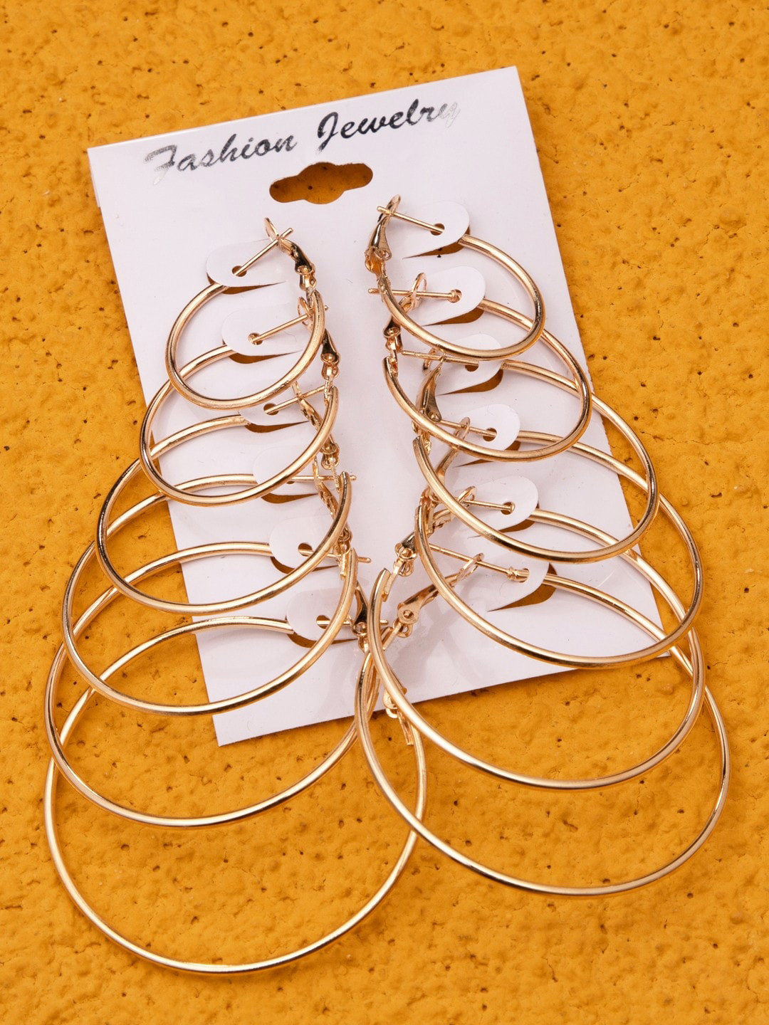 

anore Gold-Toned Circular Half Hoop Earrings