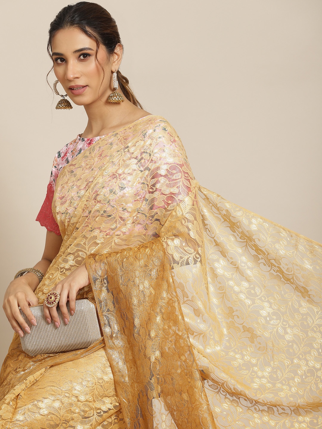 

Chhabra 555 Mustard & Tan Woven Design Chantilly Lace Saree