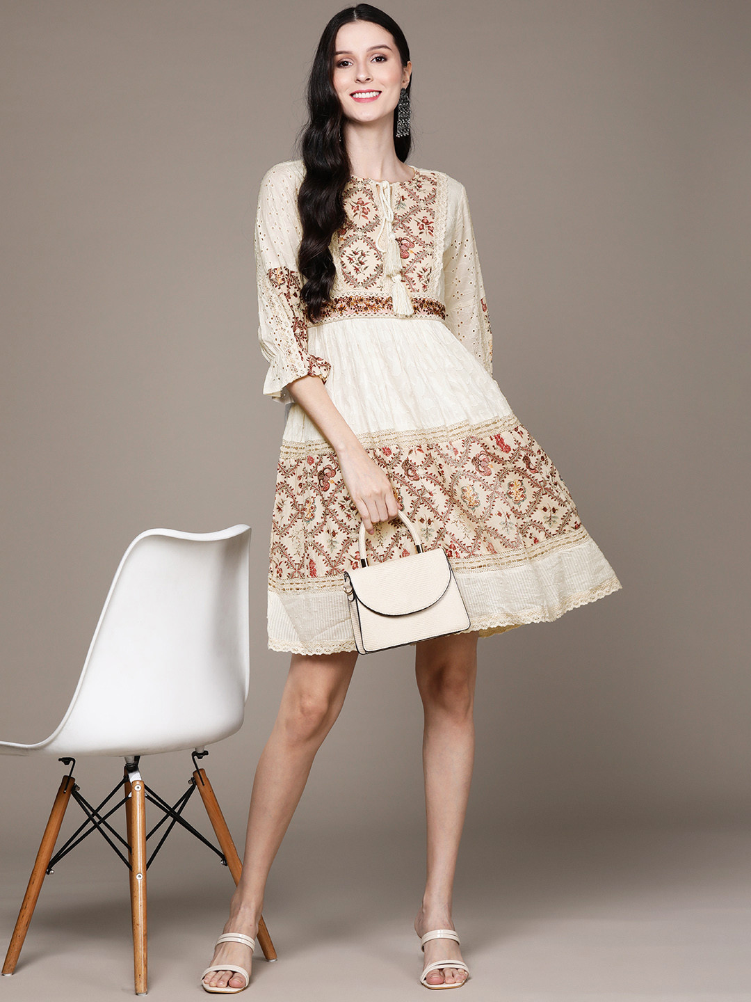 

Ishin Cream-Coloured & Maroon Ethnic Motifs Embroidered Tie-Up Neck A-Line Dress