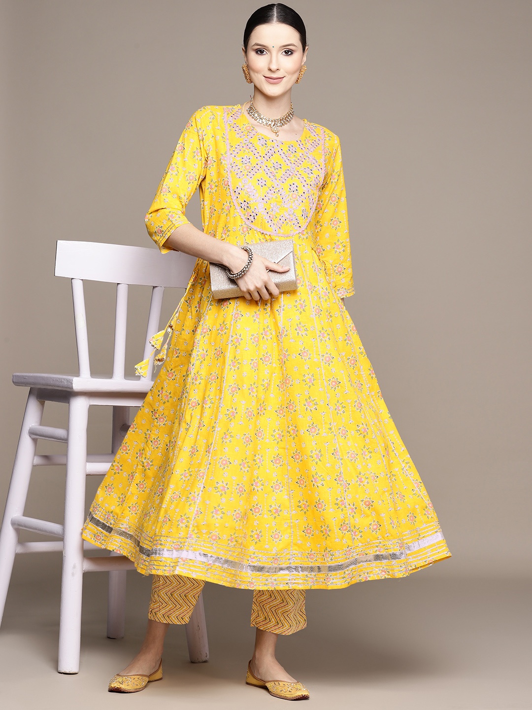 

Ishin Women Mustard Yellow Floral Embroidered Pure Cotton Kurta with Trousers
