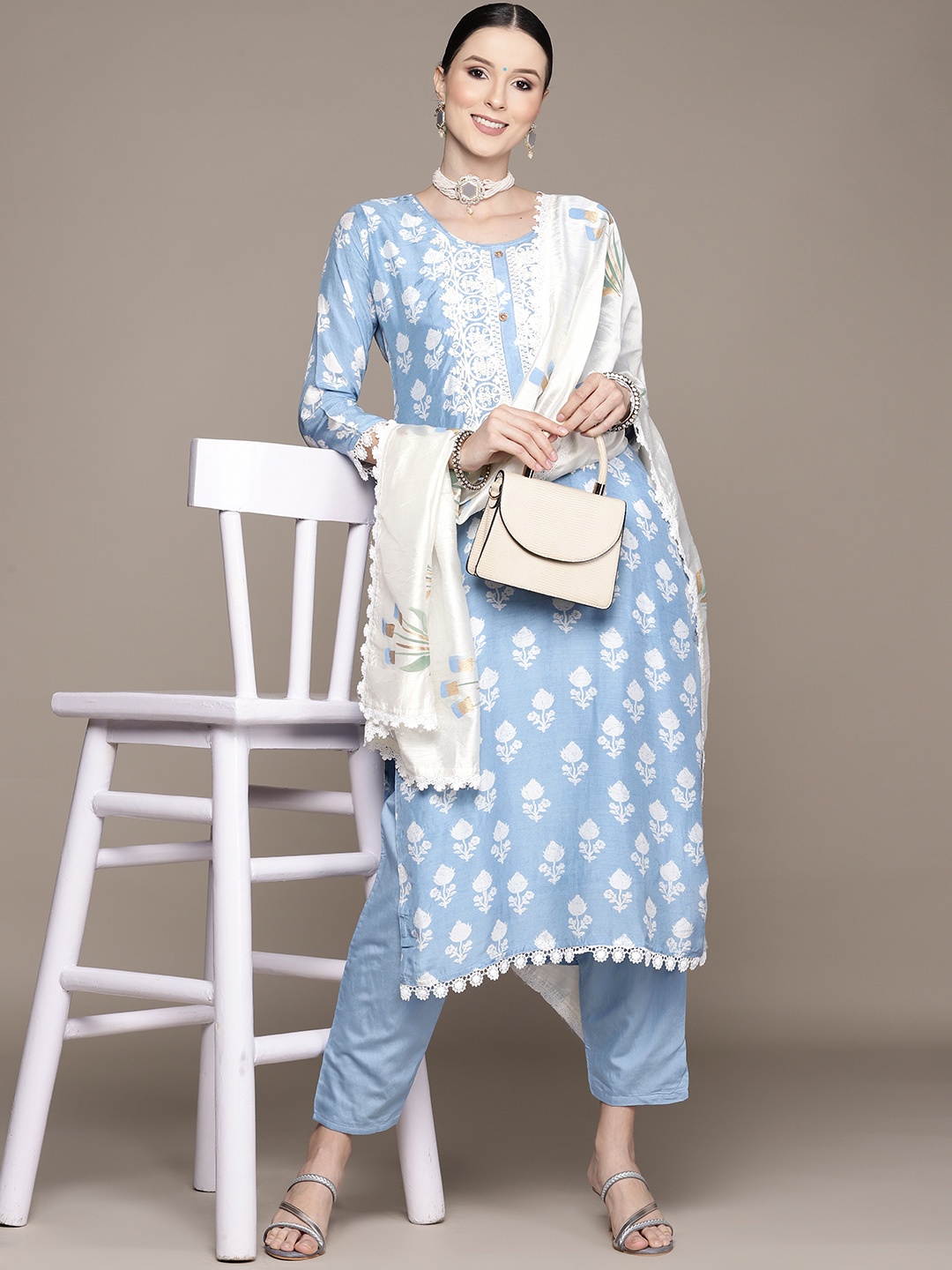 

Ishin Women Blue Floral Yoke Design Thread Work Kurta with Trousers & With Dupatta