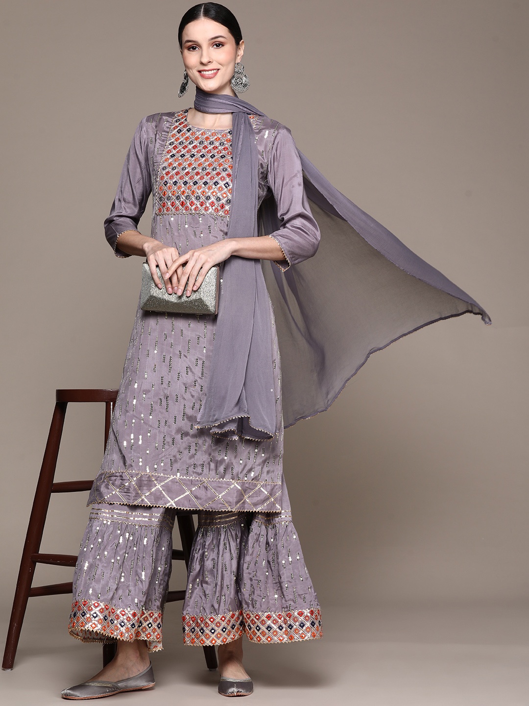 

Ishin Women Grey Floral Yoke Design Gotta Patti Kurta with Sharara & With Dupatta