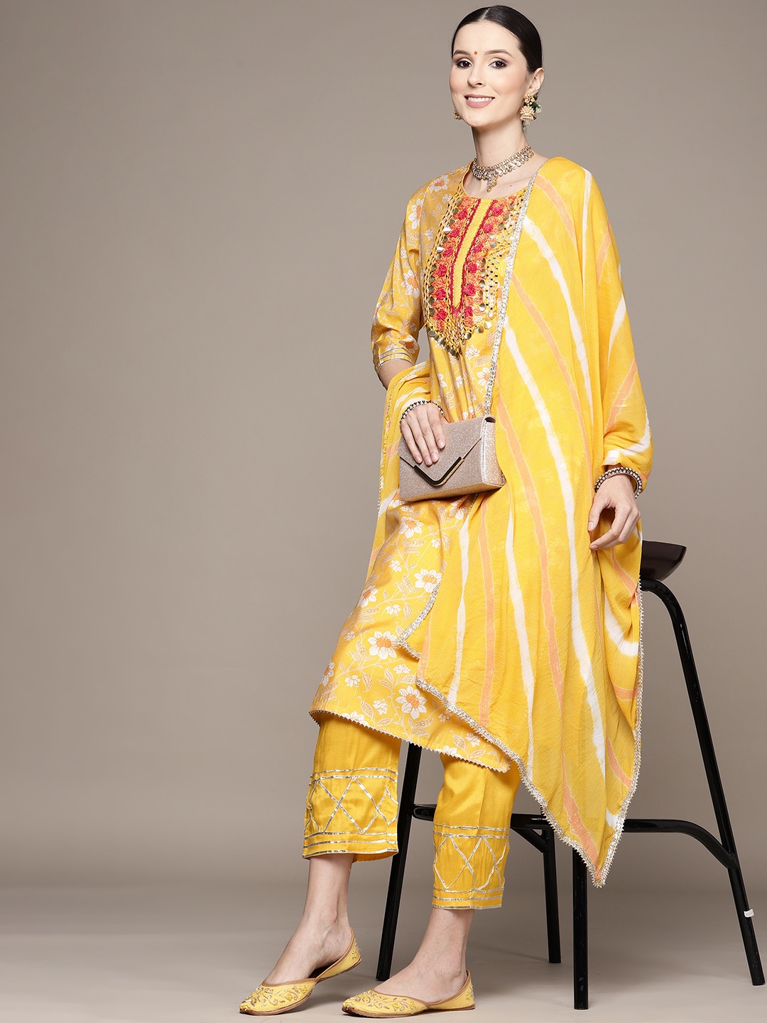 

Ishin Women Yellow Floral Yoke Design Sequinned Kurta with Trousers & With Dupatta