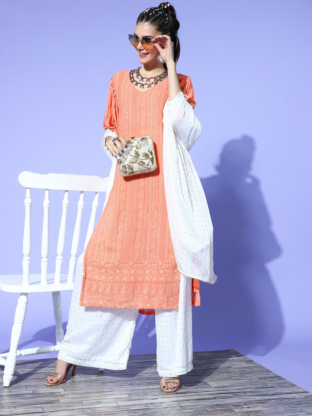 

Saadgi Women Beautiful Peach Silk Georgette Ethereal Embroidery Dress Material