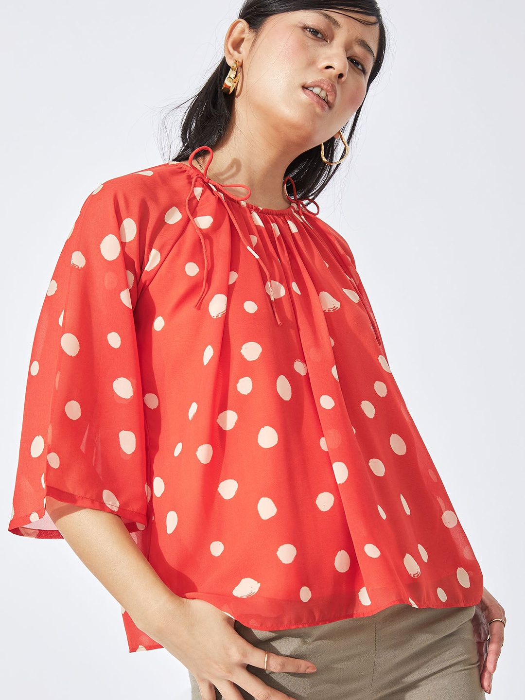 

The Label Life Coral Orange Polka Dot Print Georgette Gathered Top