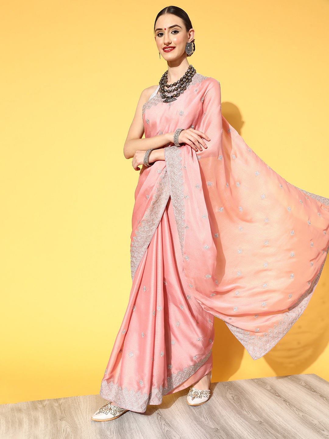 

Chhabra 555 Peach-Coloured & Silver Ethnic Motifs Aari Work Saree