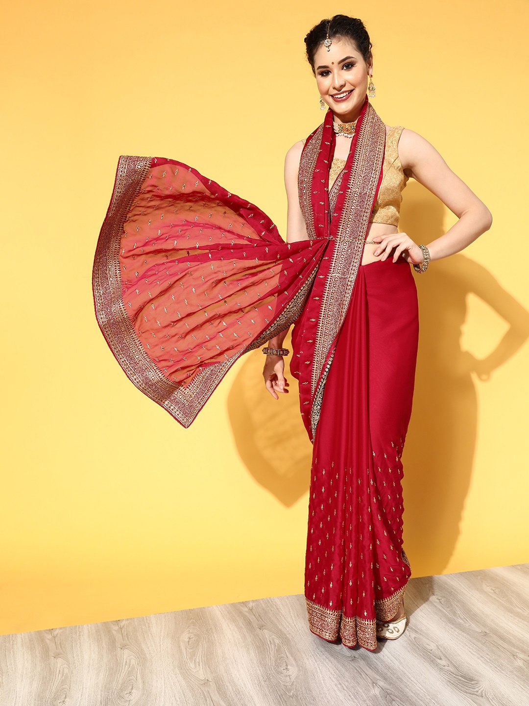 

Chhabra 555 Red & Golden Ethnic Motifs Aari Work Saree