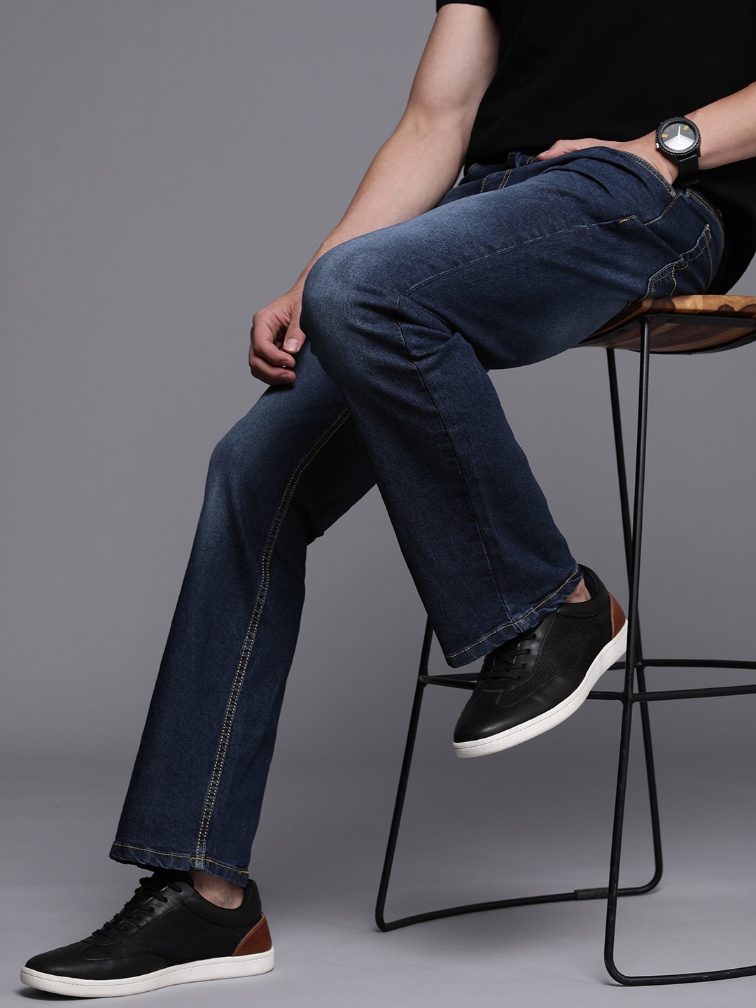 

WROGN Men Blue Bootcut Light Fade Stretchable Jeans