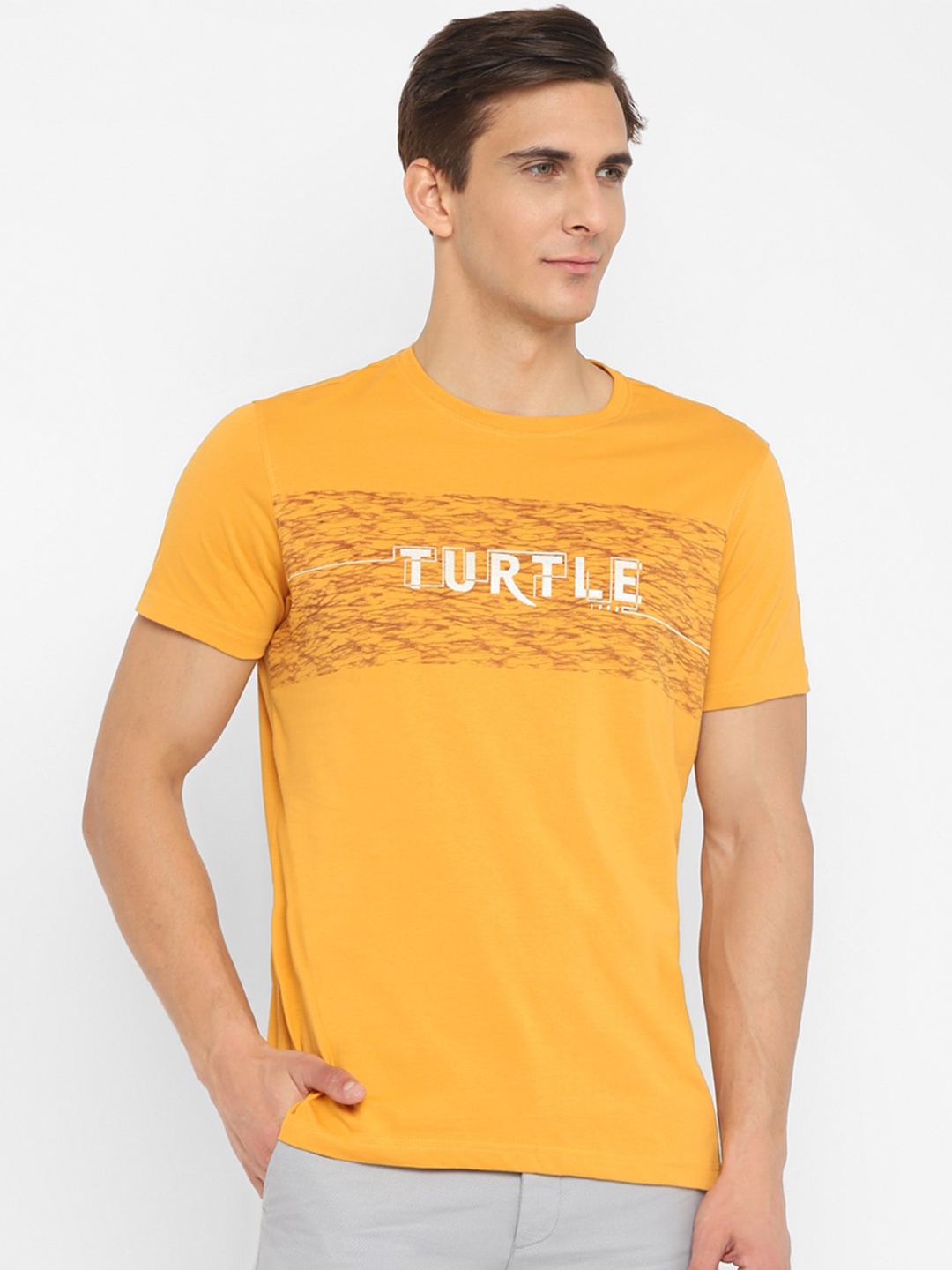 

Turtle Men Yellow Typography Printed Pure Cotton Slim Fit T-shirt