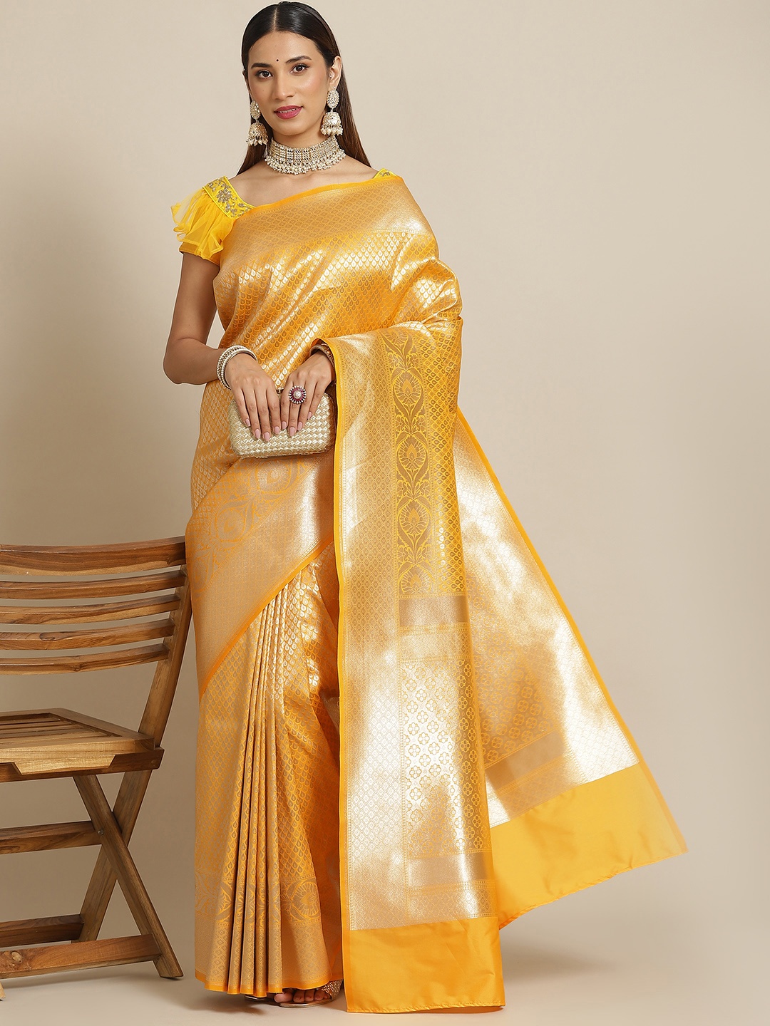 

Chhabra 555 Yellow & Gold-Toned Ethnic Motifs Zari Silk Blend Banarasi Saree