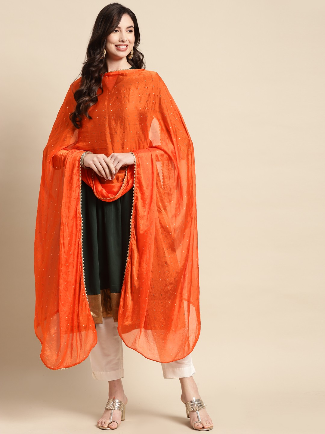 

Saadgi Orange & Golden Mukaish Handwork Dupatta With Gotta Patti
