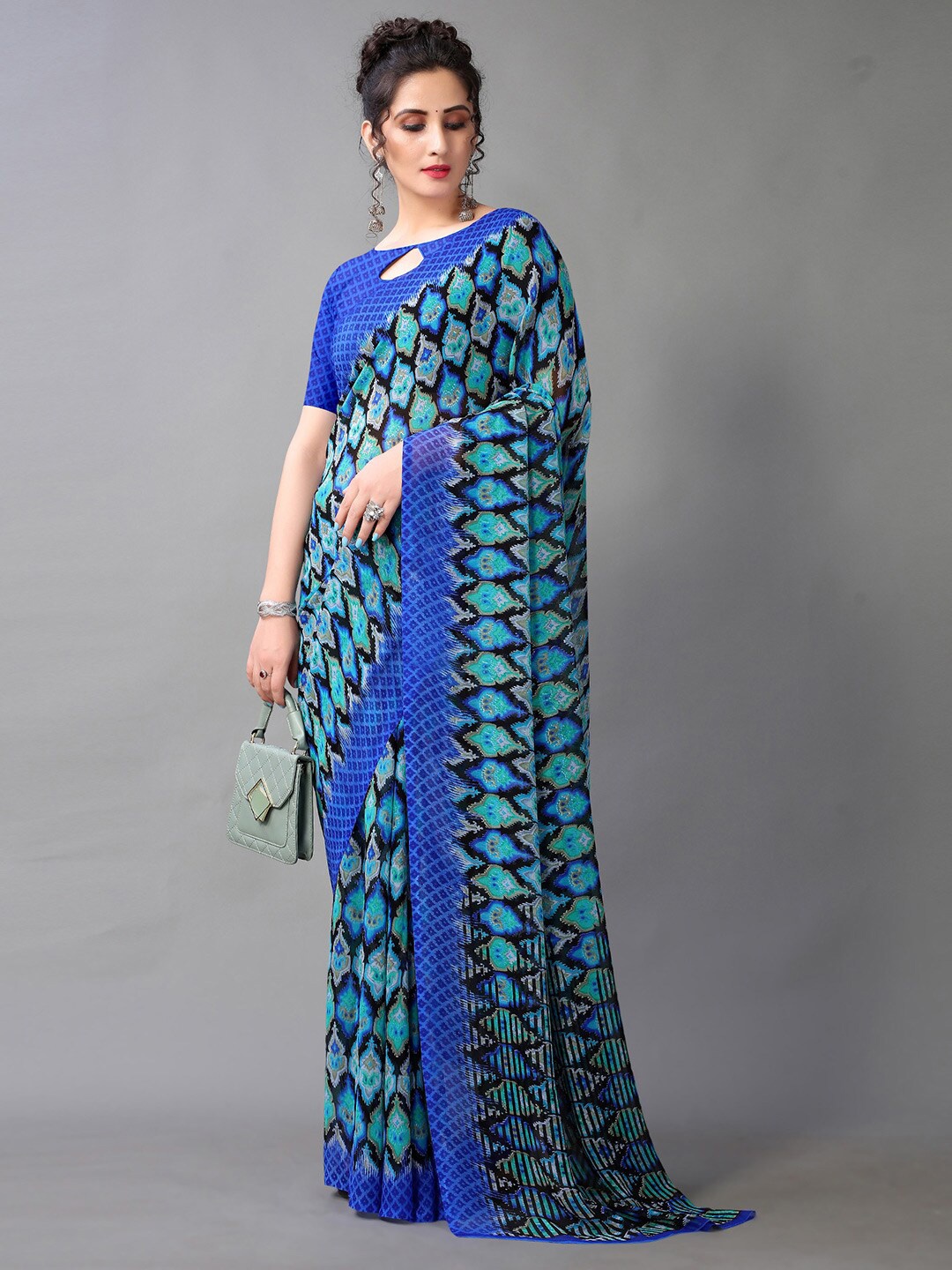 

HRITIKA Blue & Turquoise Blue Georgette Ethnic Motifs Saree