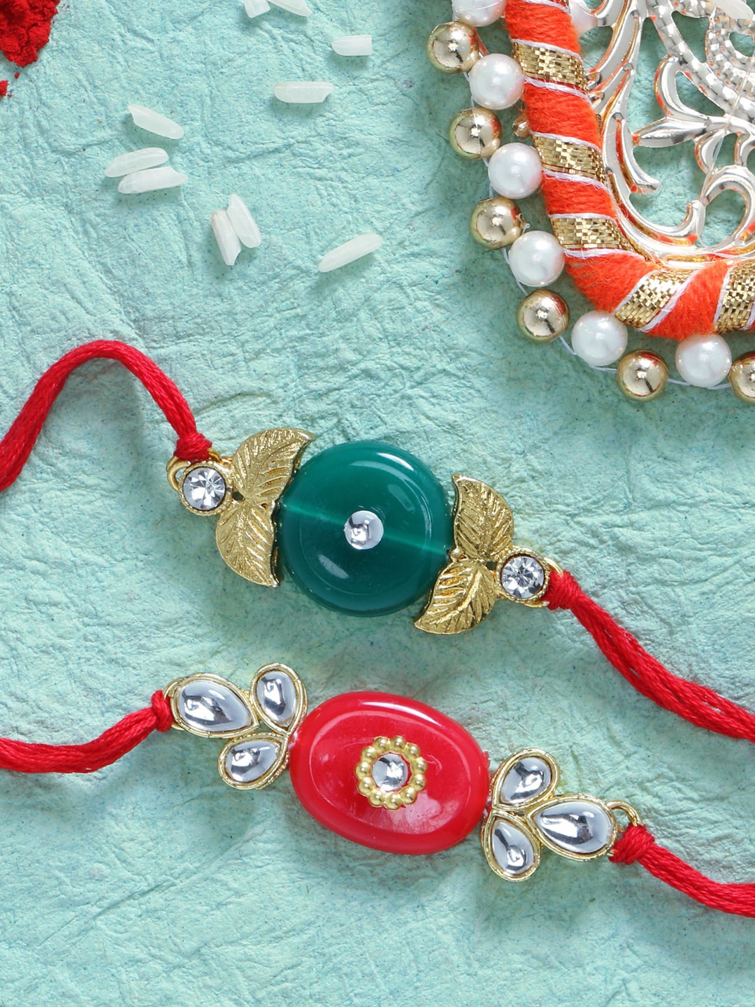 

LIVE EVIL Pack of 2 Gold-plated Kundan Rakhis, Red