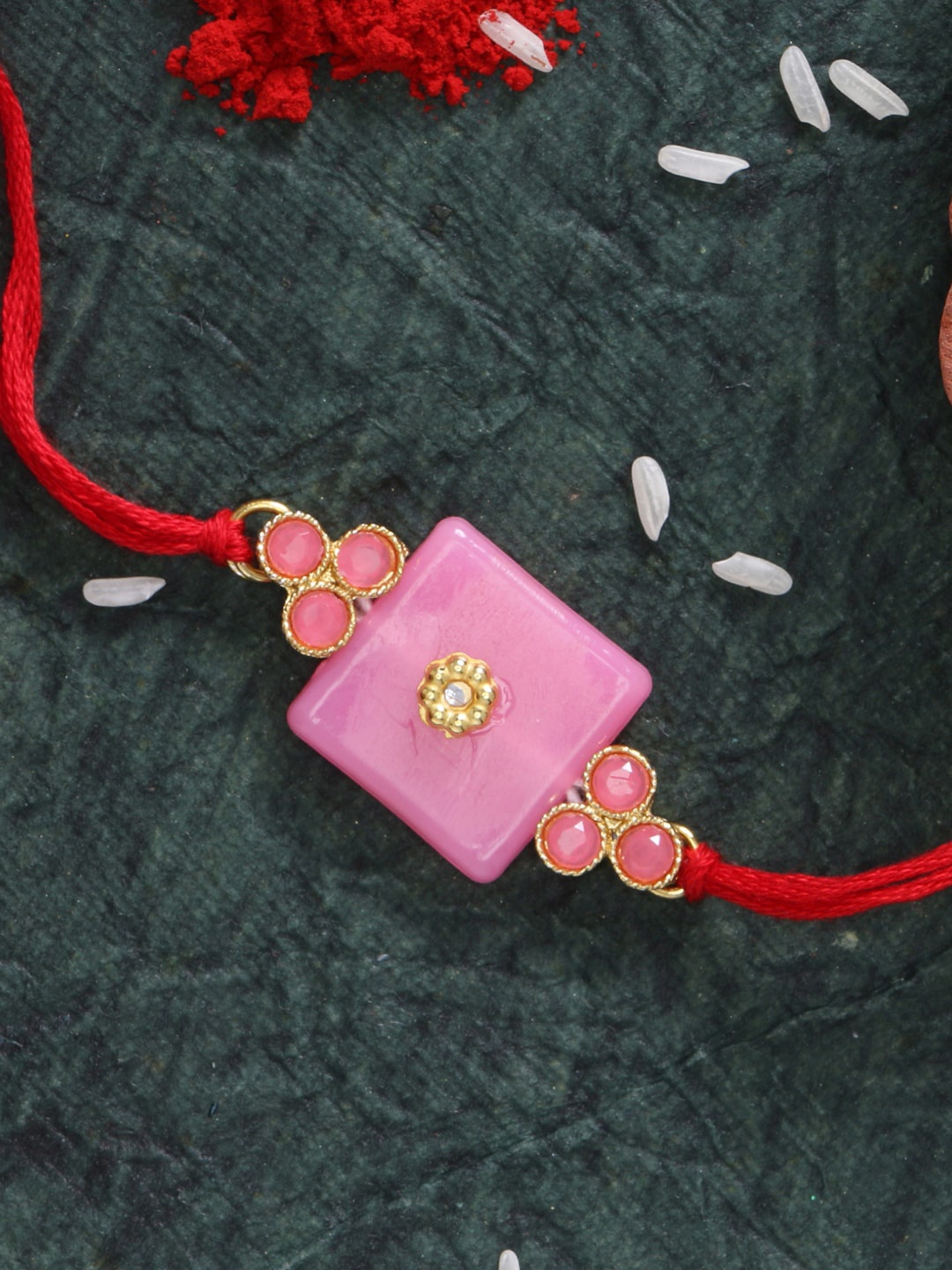 

LIVE EVIL Gold-Plated Pink Stone Studded Rakhi