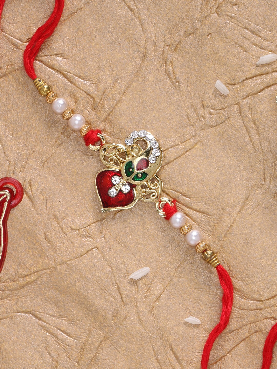 

LIVE EVIL Maroon Gold-Plated Beaded Meenakari Rakhi