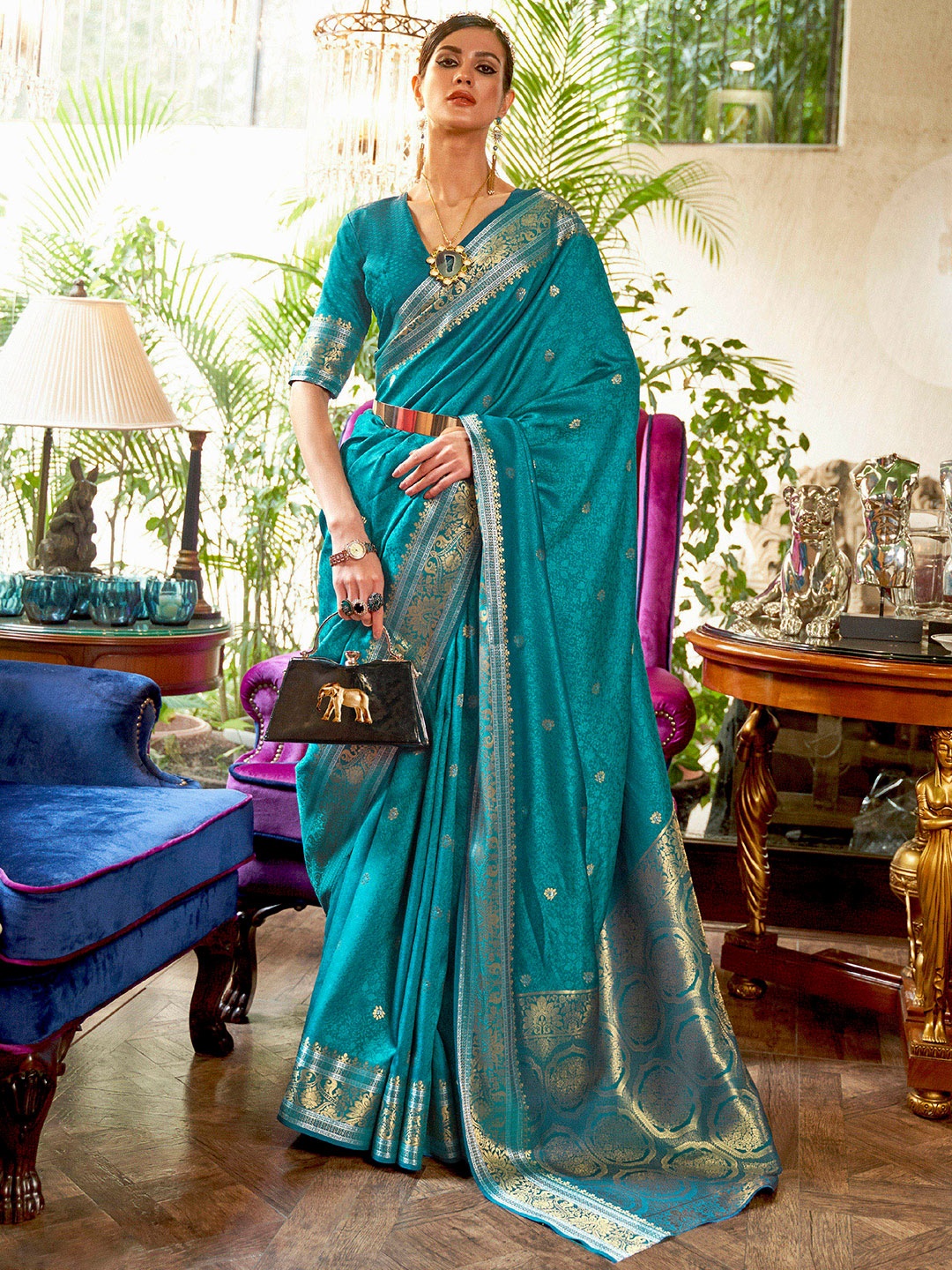 

Mitera Teal & Gold-Toned Woven Design Silk Blend Saree