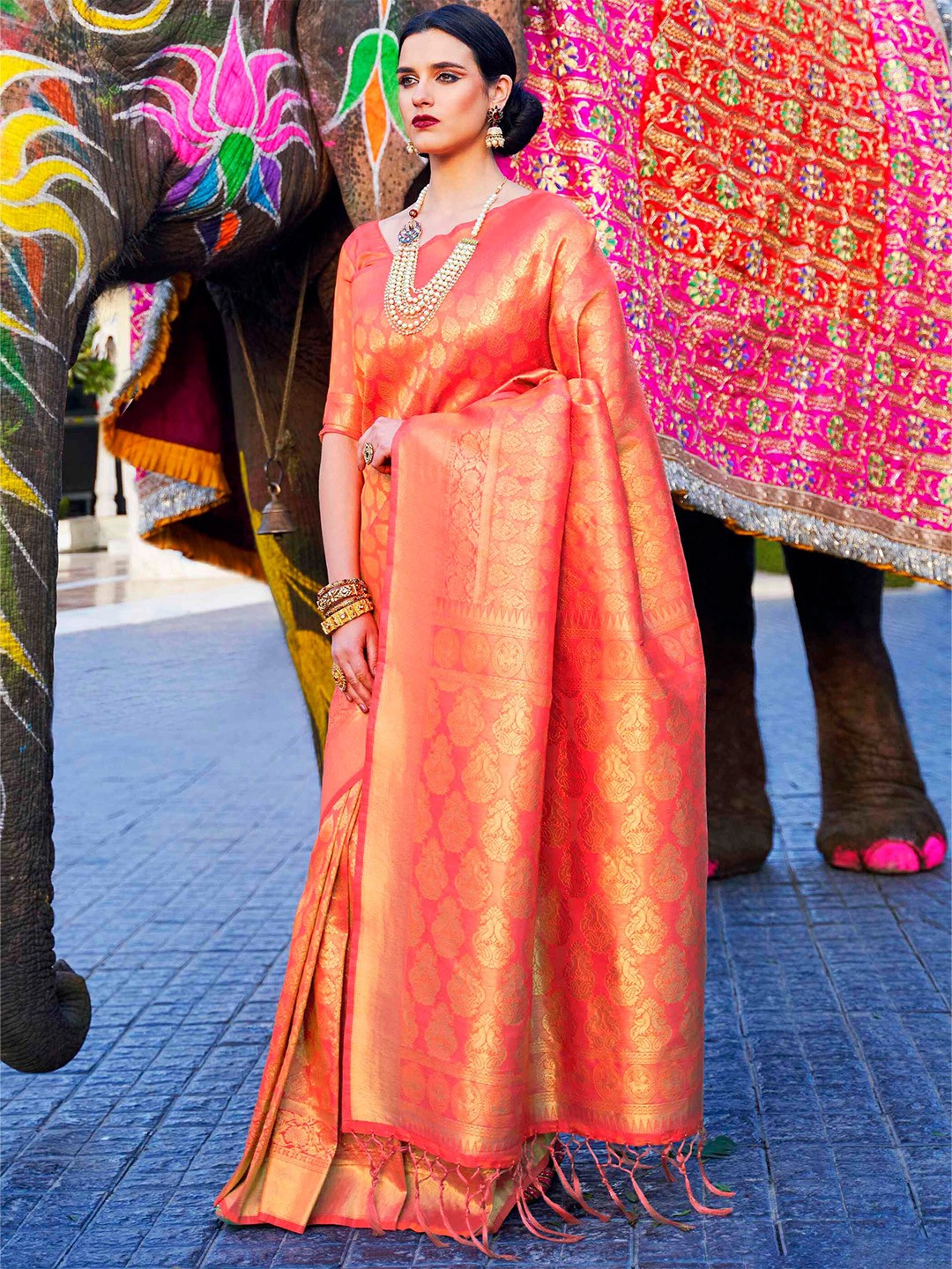 

Mitera Peach-Coloured Woven Design Silk Blend Banarasi Saree