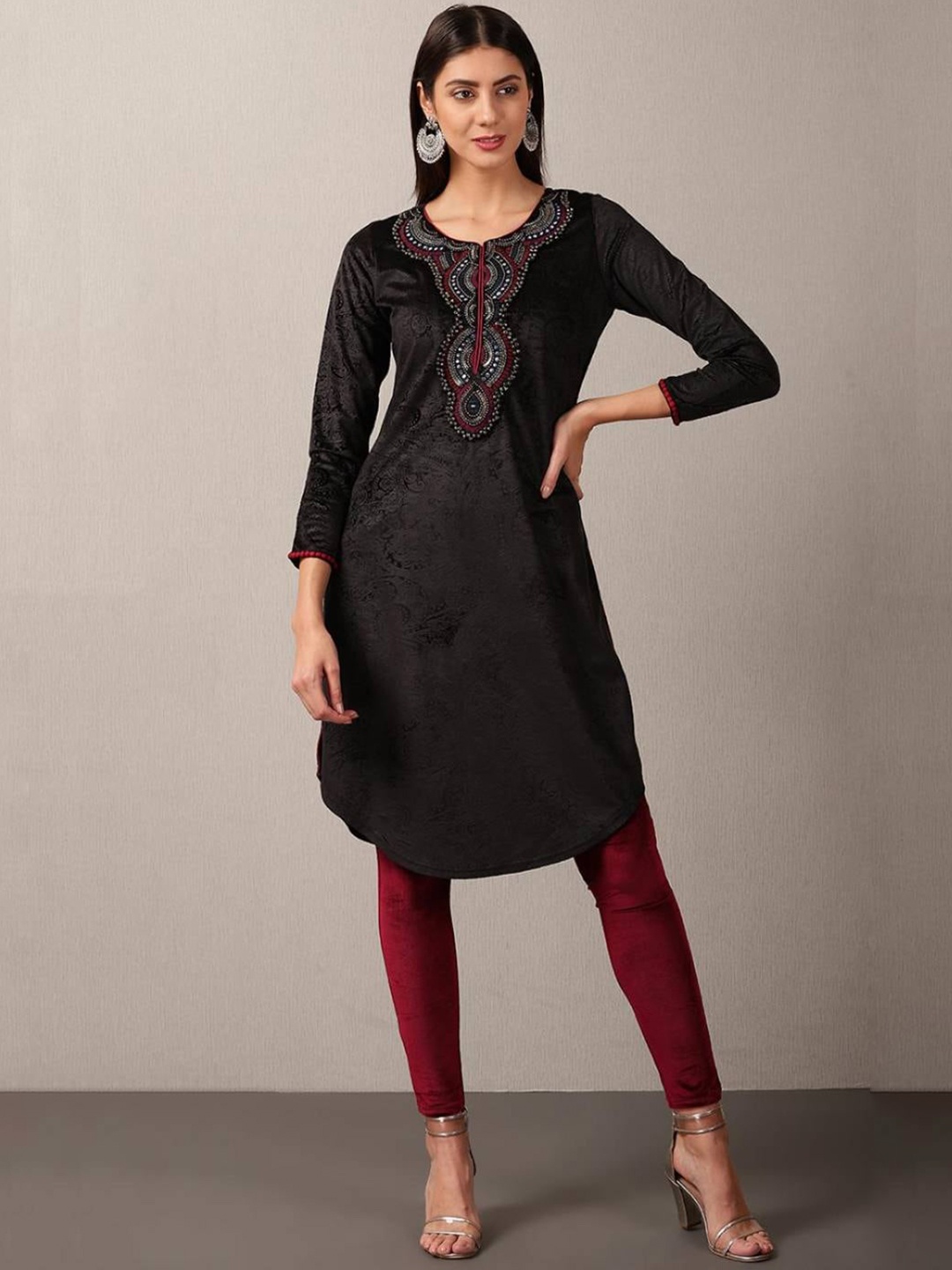 

Lakshita Women Black Geometric Embroidered Keyhole Neck Flared Sleeves Thread Work Velvet Kurta