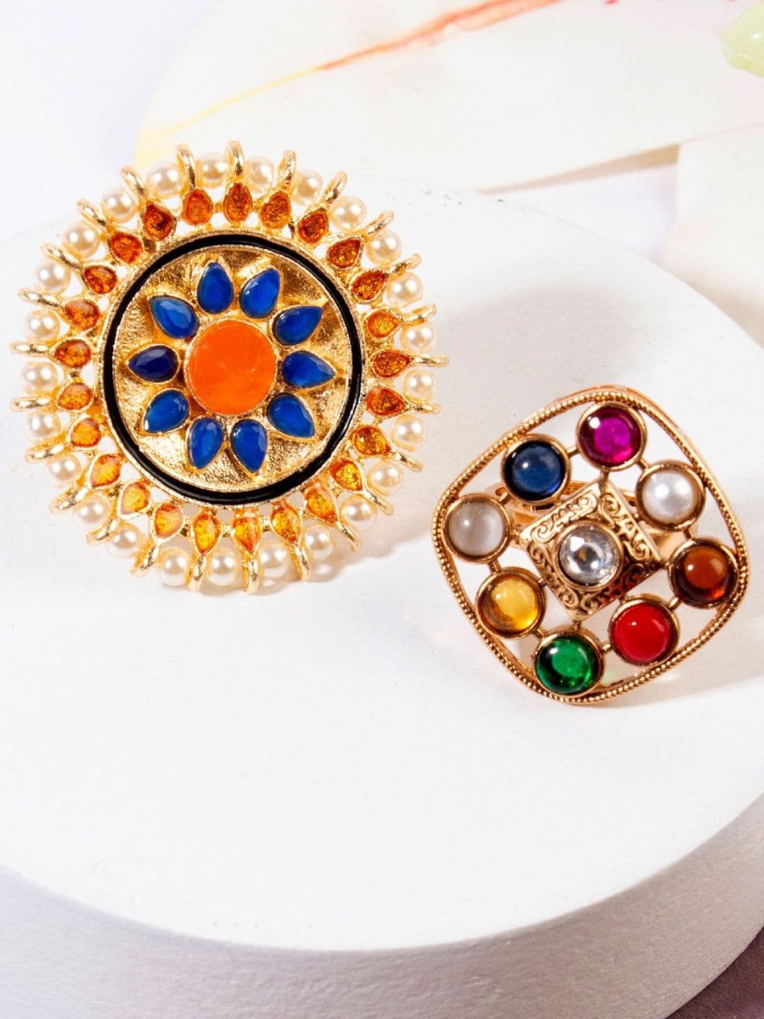 

AccessHer Set Of 2 Gold-Plated White & Blue Stone-Studded & Pearl Beaded Enamelled Adjustable Finger Ring