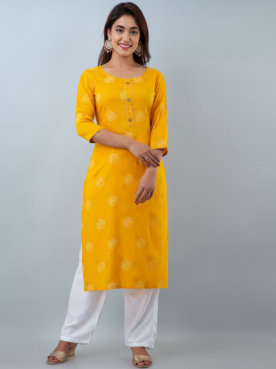

DORIYA Women Yellow Embroidered Kurti with Palazzos